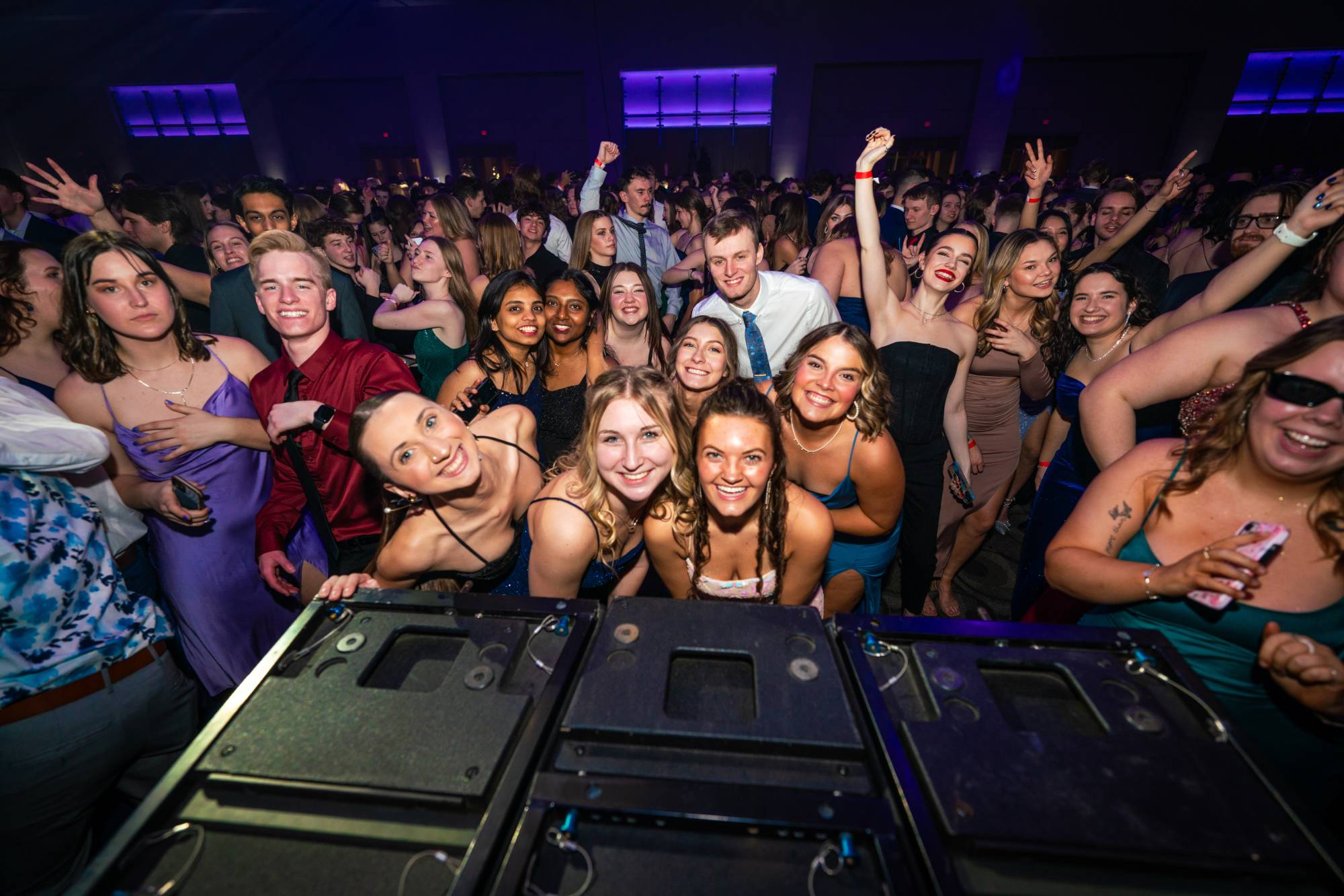 Students dancing and smiling for the camera at Presidents' Ball